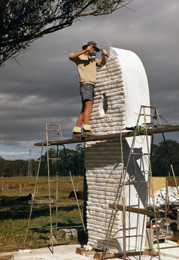 Carving high on scaffold